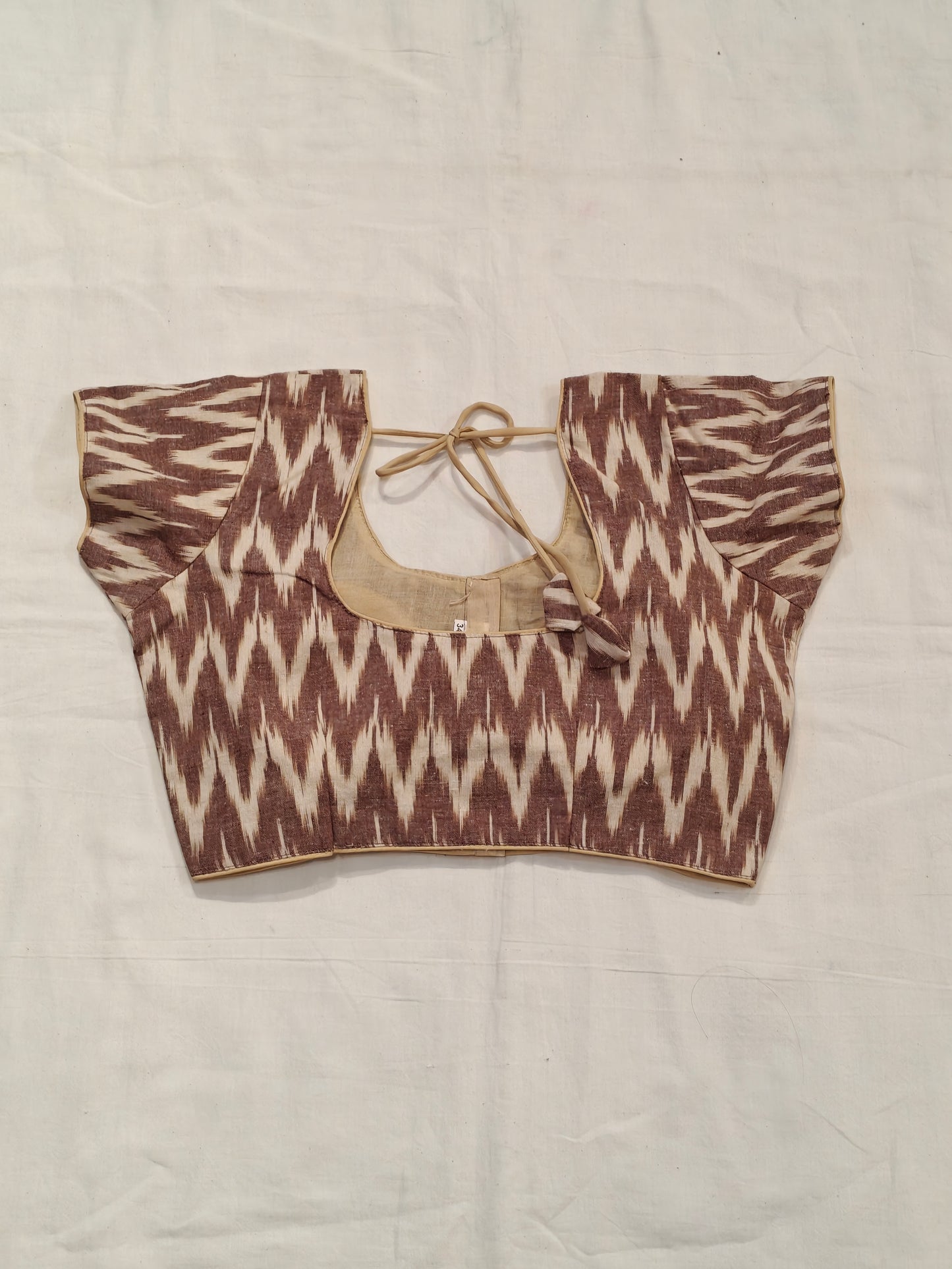 Brown n cream zig zag pattern ikat cotton padded blouse with dori