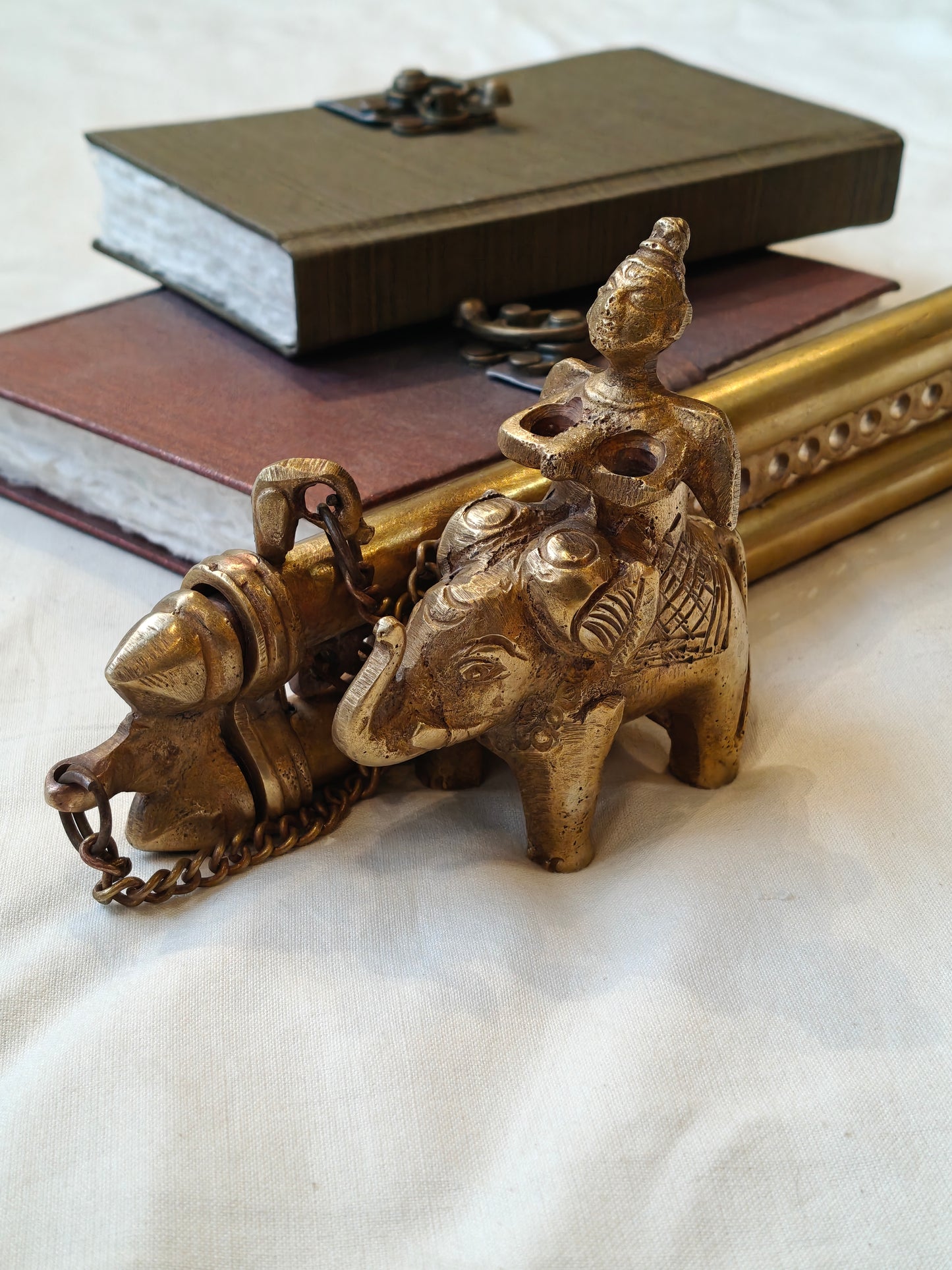 Vintage brass handcrafted ink pot with a person riding on an elephant design, double pen / quill holder with lock