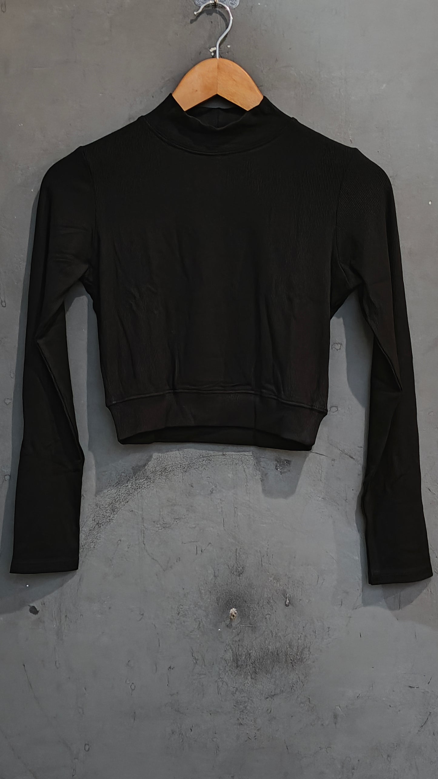 Textured stretchable full sleeves closed neck blouse