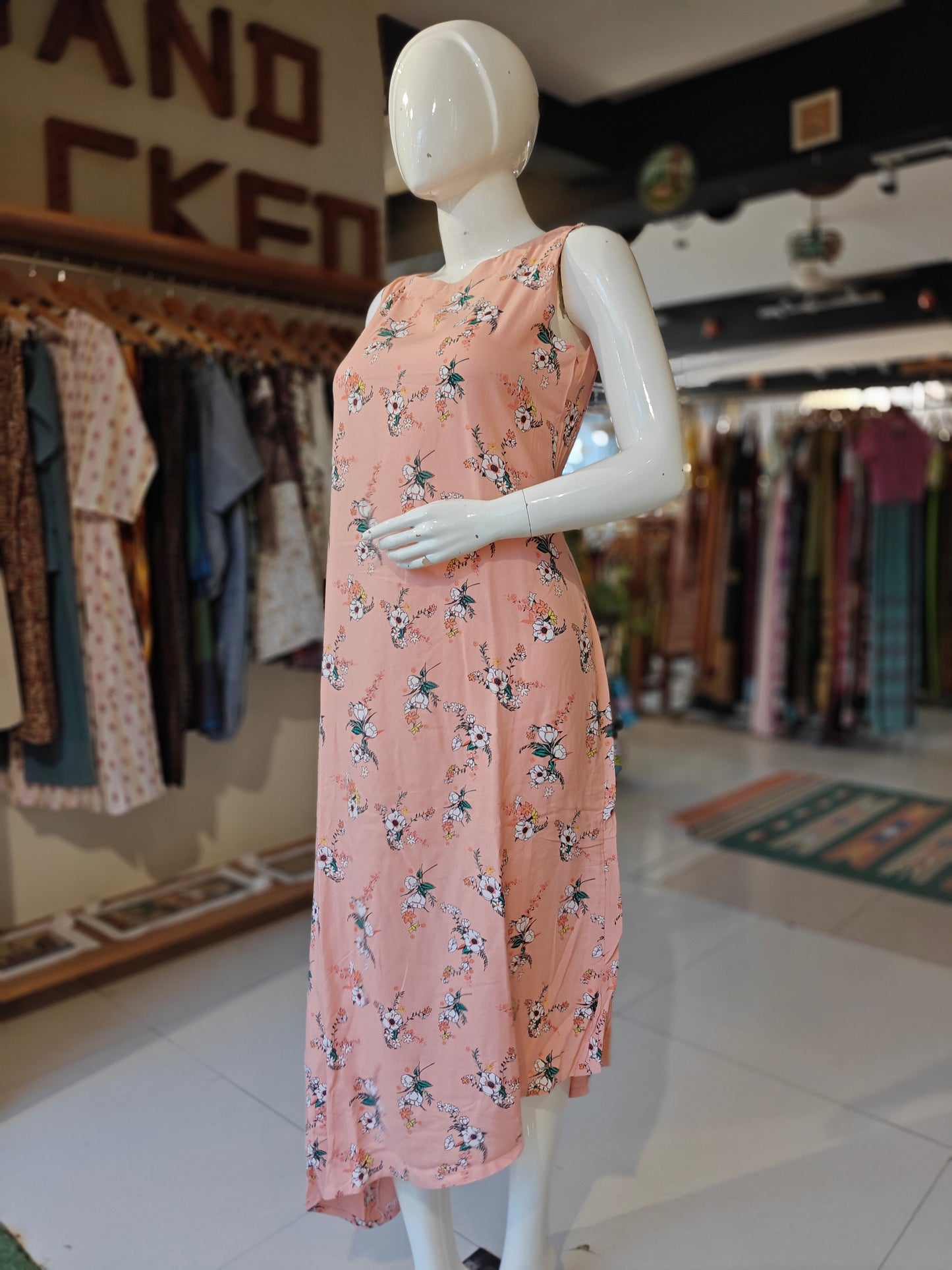 Peach asymmetric hem rayon dress with floral prints