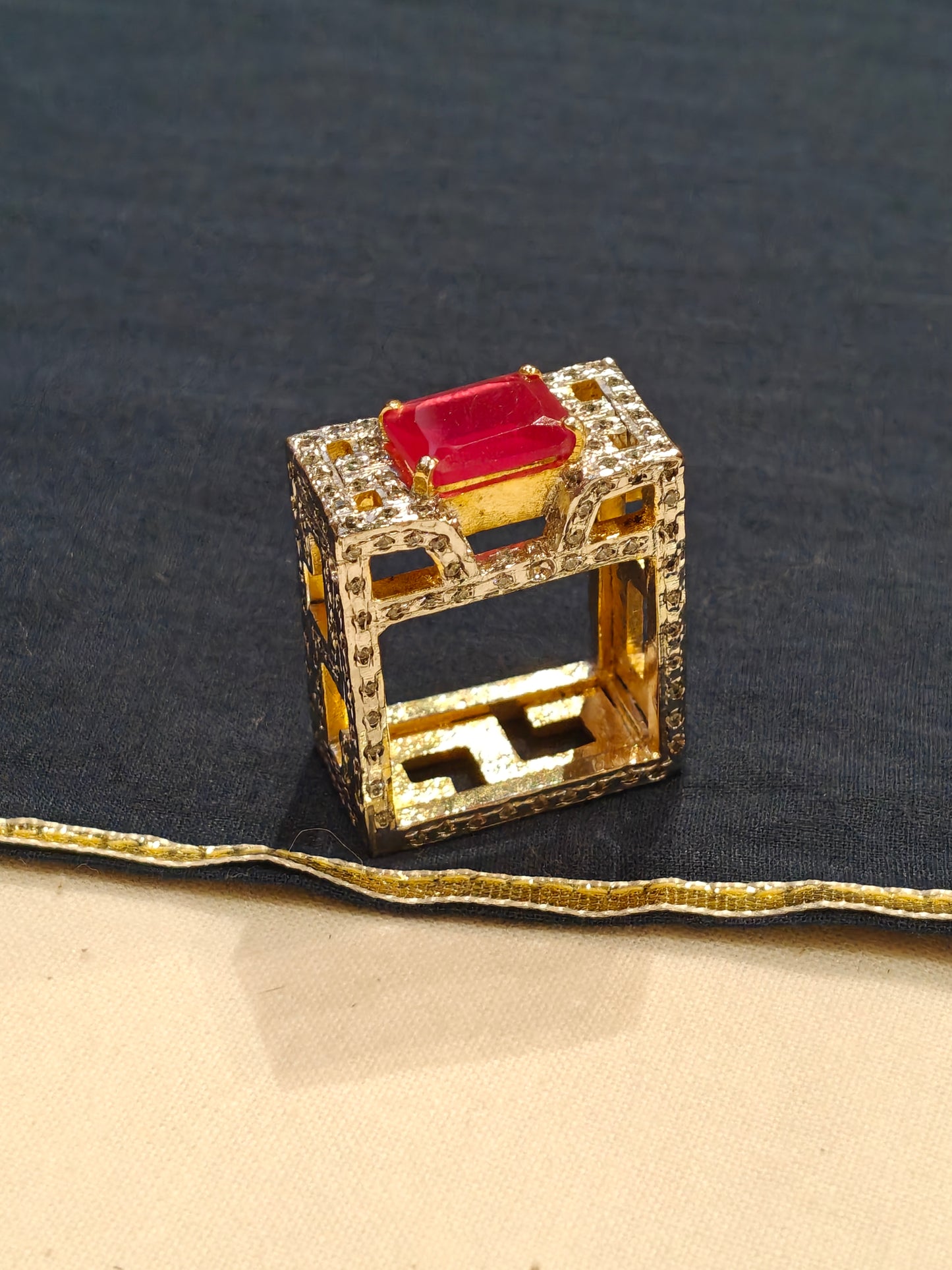 Square shaped finger ring with red stone