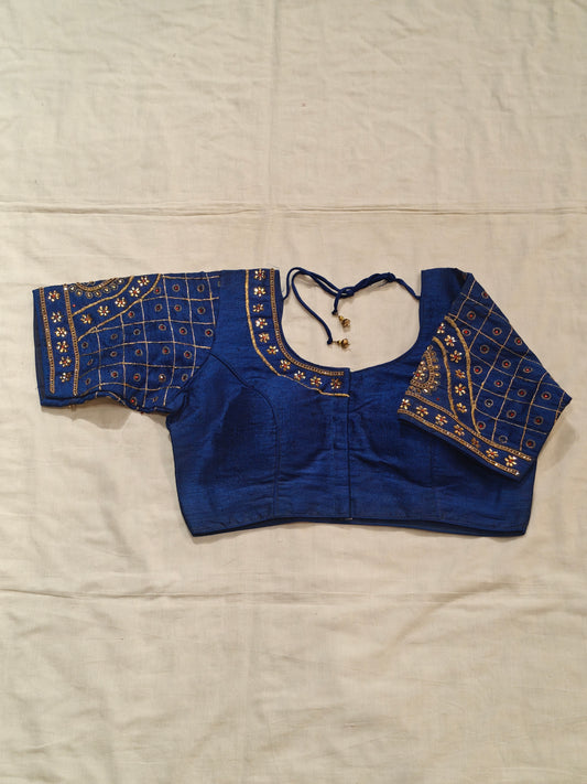 Blouse with golden embroidery and stonework on sleeves and half neck