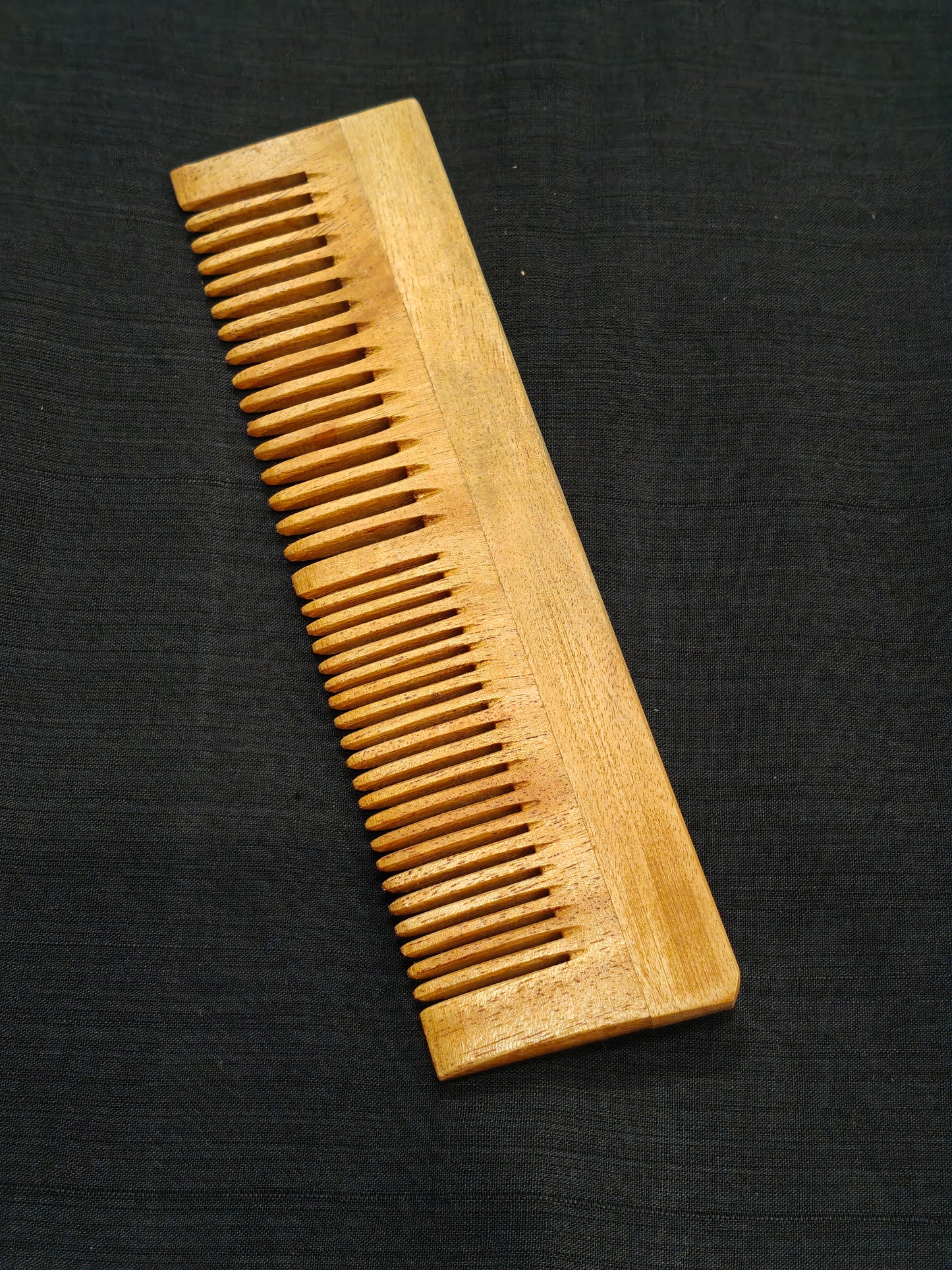 Handcrafted Neem Wood combs in different styles - click to see
