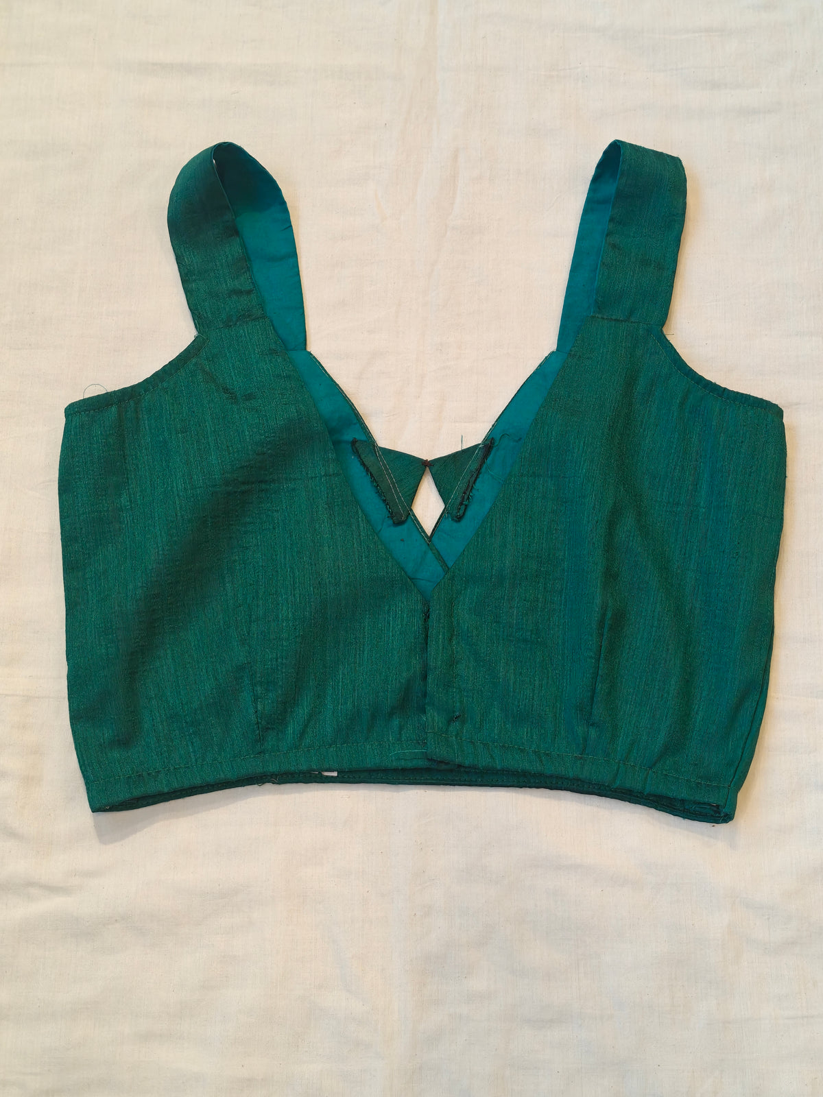 Green raw silk sleeveless blouse with crossover V-neck - back open