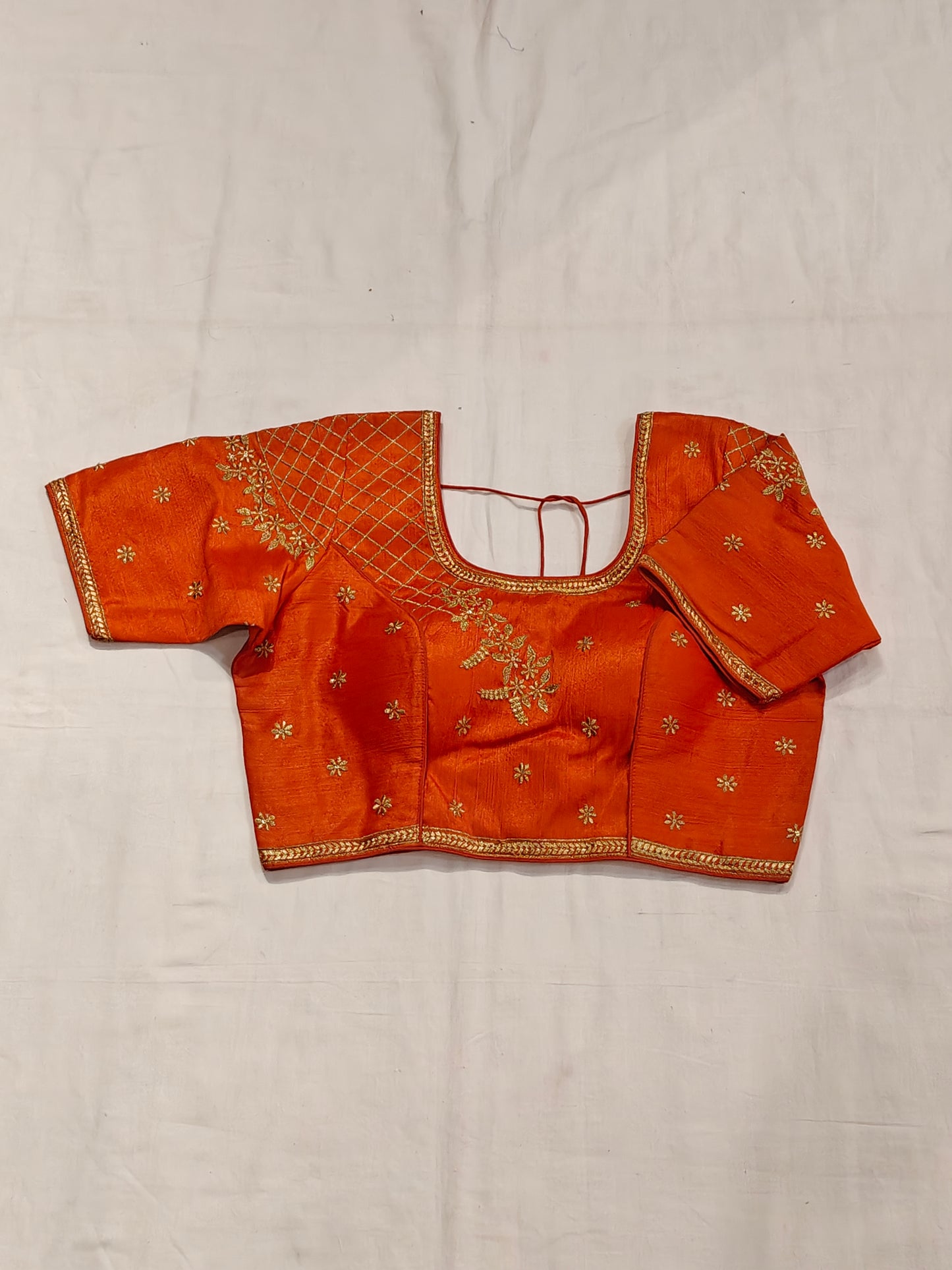 Silk short sleeves blouse with golden embroidery