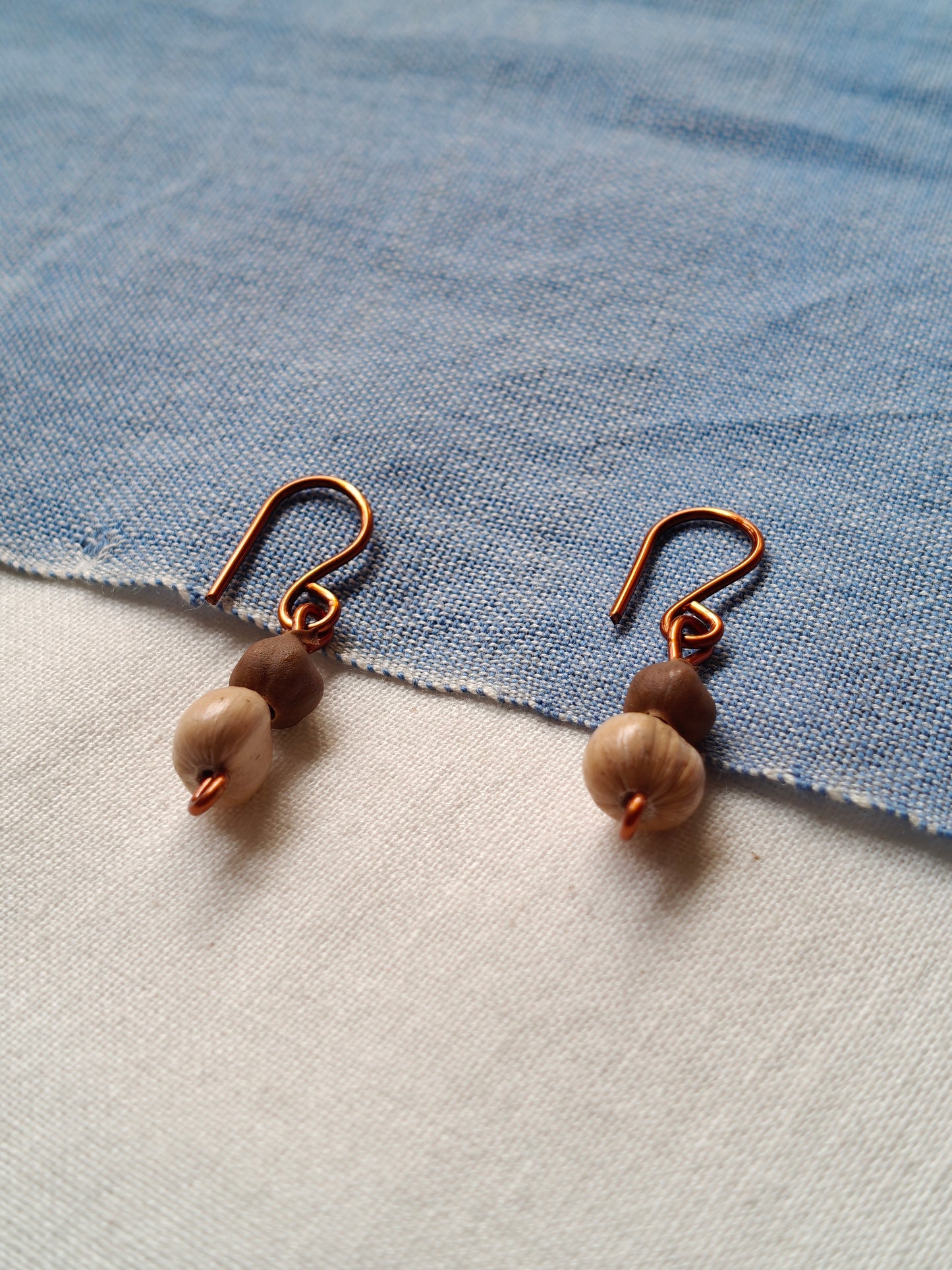Handcrafted earrings designed with seed