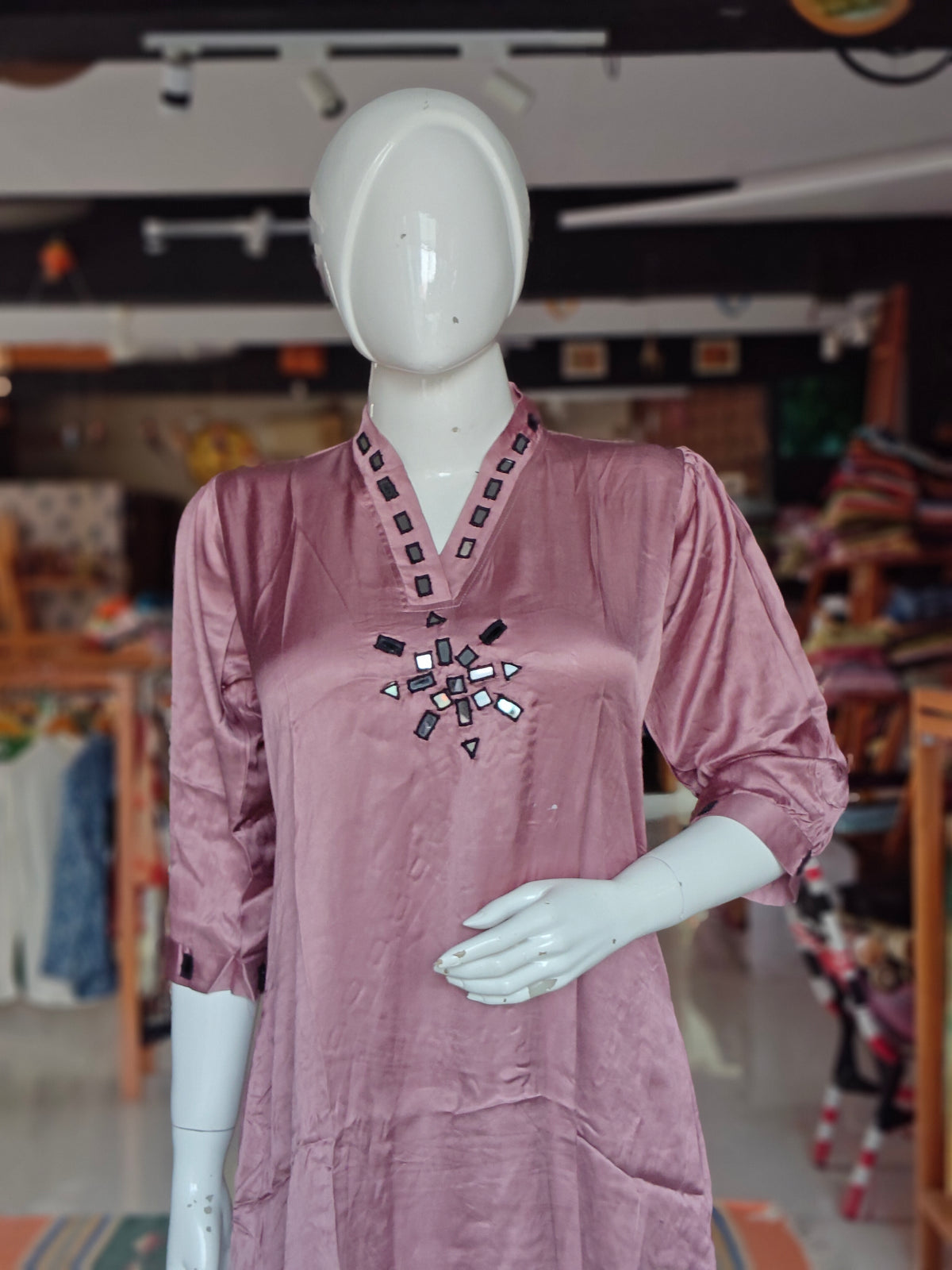 Dusty rose modal dress featuring V-neck and mirror embroidery