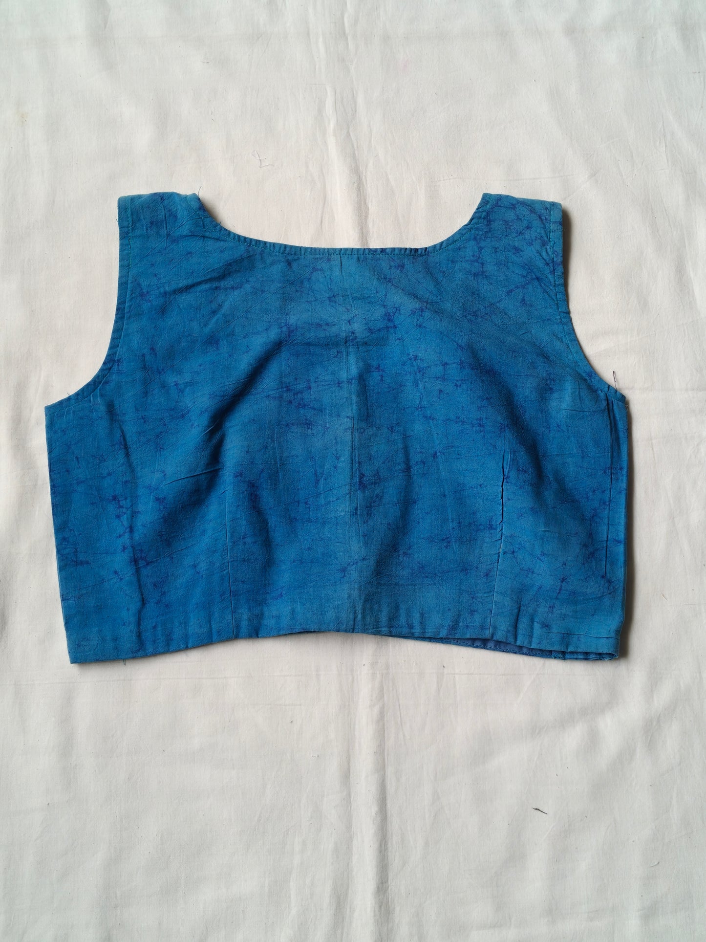 Blue hand batik sleeveless silk blouse