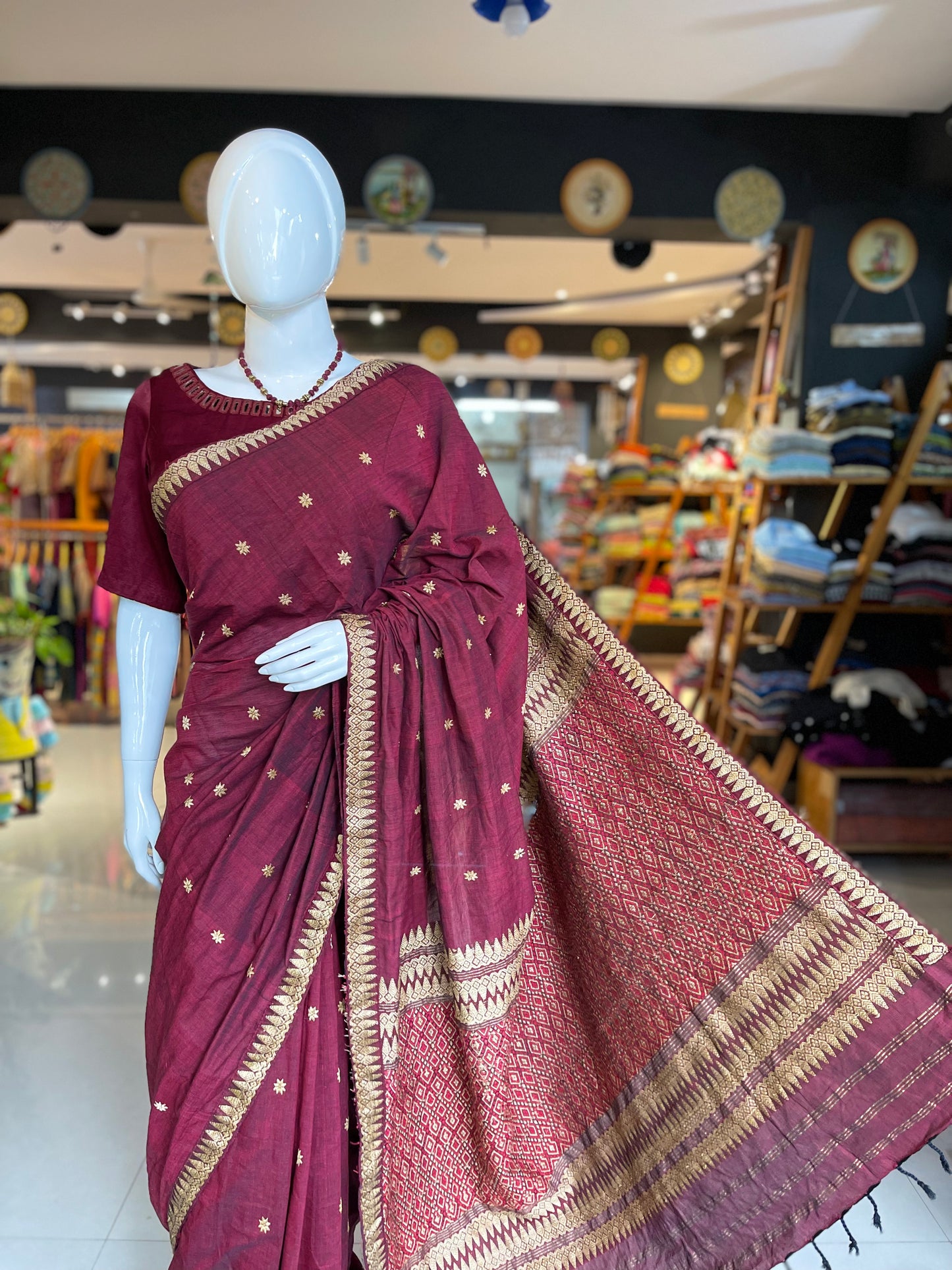 Maroon pure cotton Assam handloom saree with golden motifs