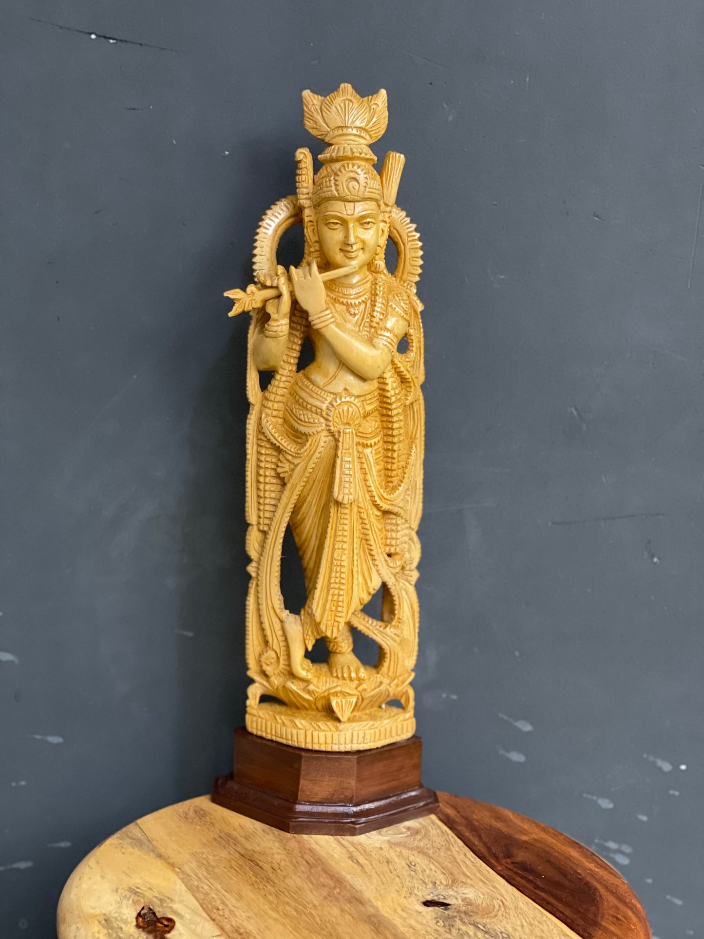 Krishna wood statue