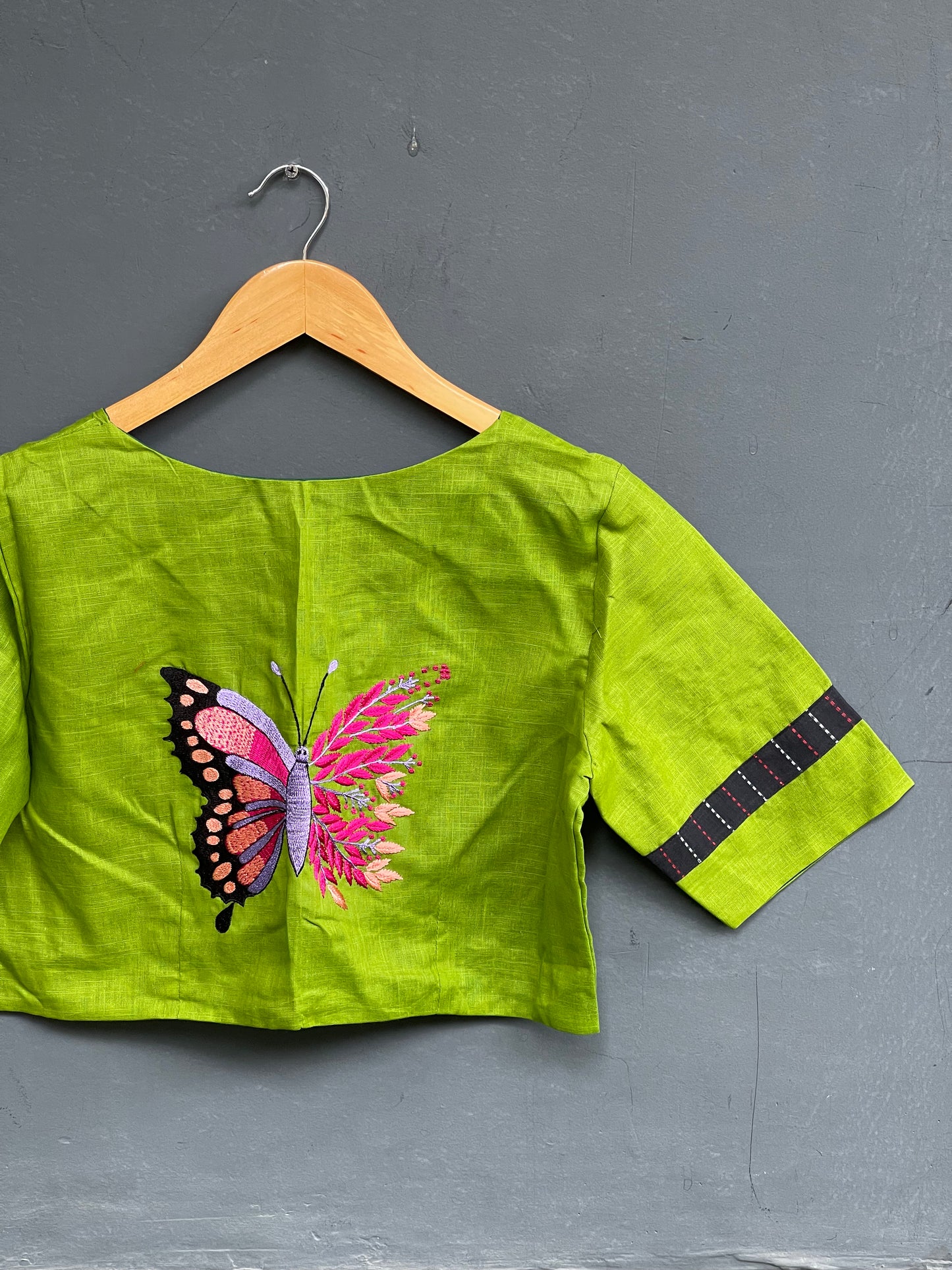 Olive green cotton blouse with butterfly back embroidery
