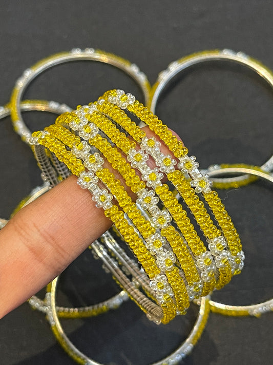 Yellow and White translucent glass beads bangles on metal base