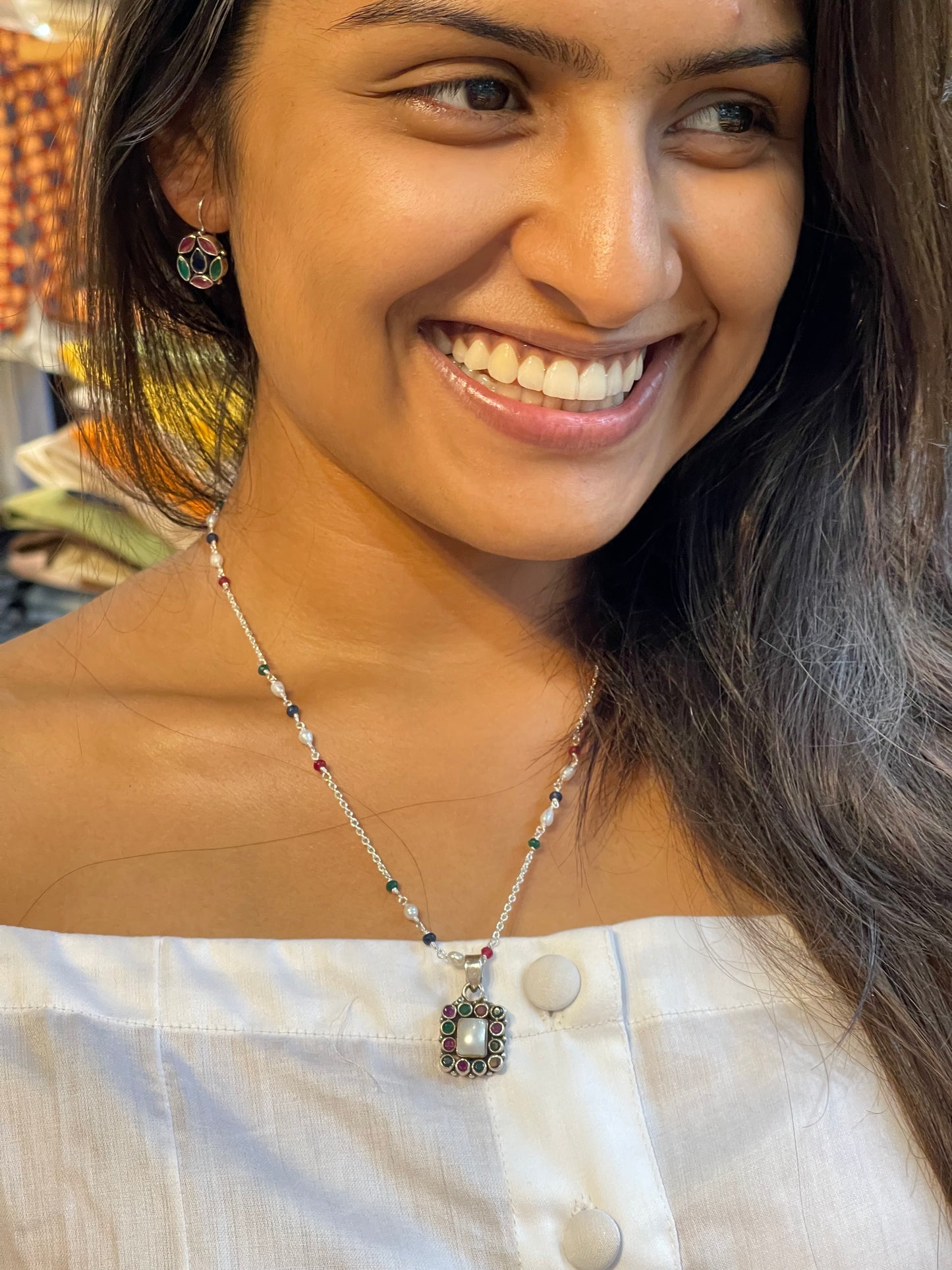 Silver chain with colourful beads and squarish stone pendant