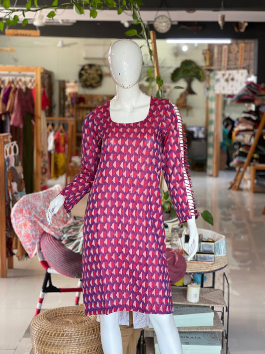 Ikat dress with multi line piping sleeves