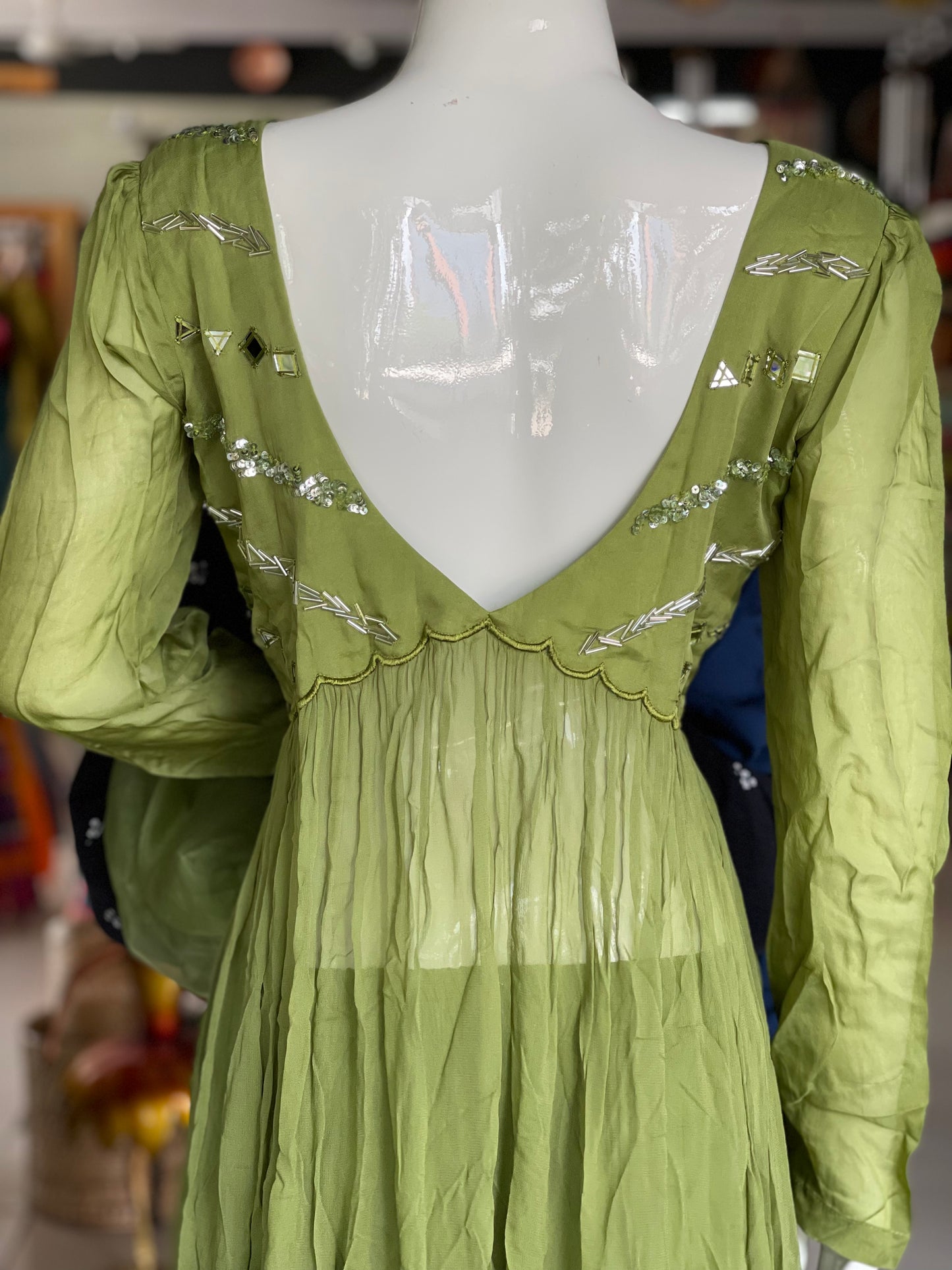 Green embroidered long top with matching pants and dupatta