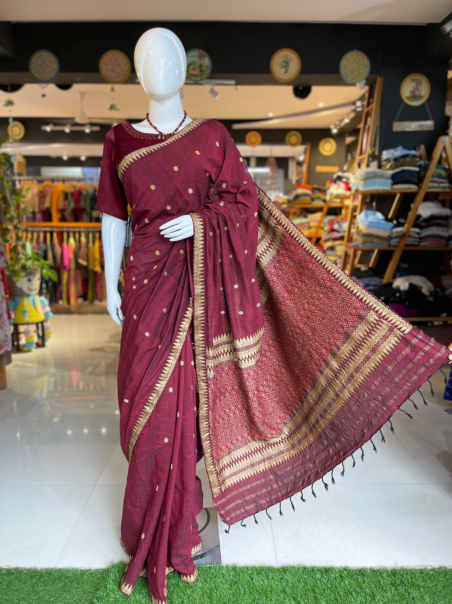 Maroon pure cotton Assam handloom saree with golden motifs