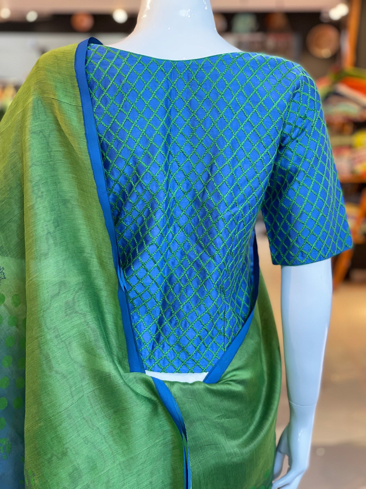 Blue silk cotton long blouse with green chikankari hand embroidery