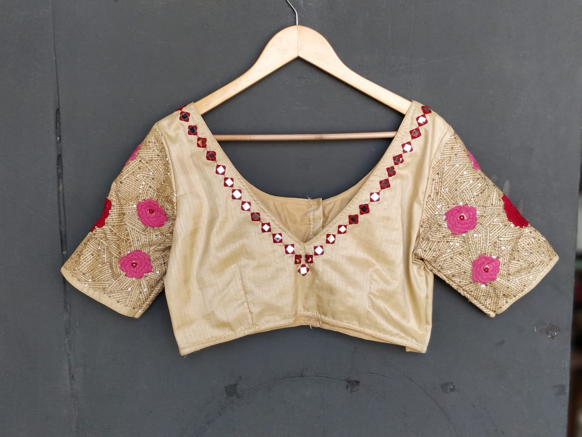 Cream silk blouse with heavy hand embroidery for sleeves and mirrors for back