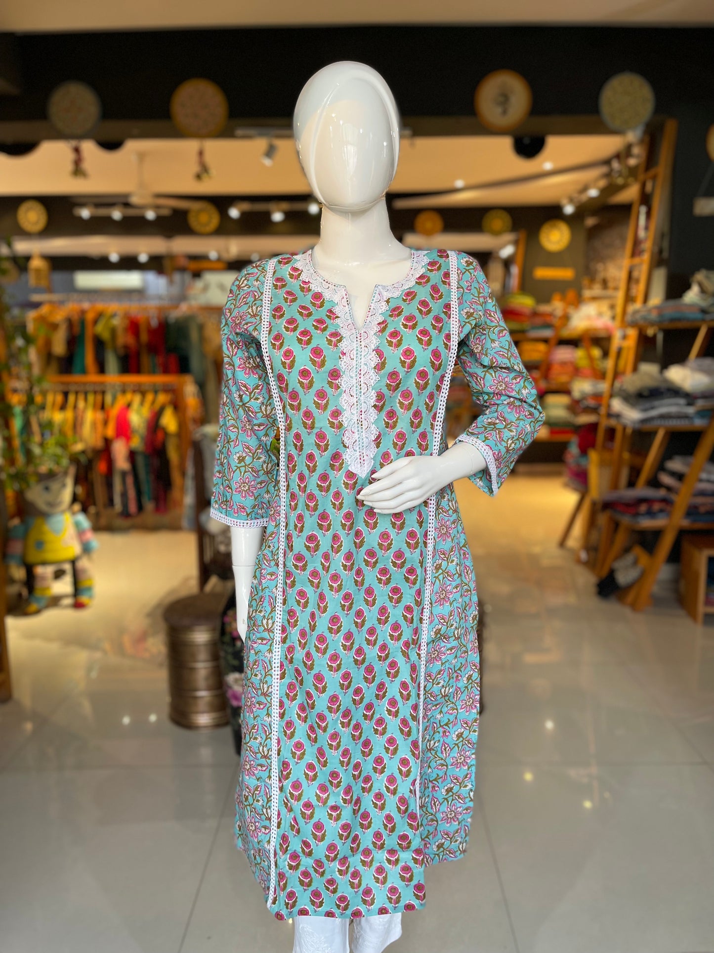 Blue printed cotton A-line Kurti with lace