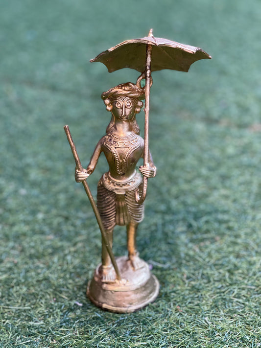 Dokra craft brass person with an umbrella