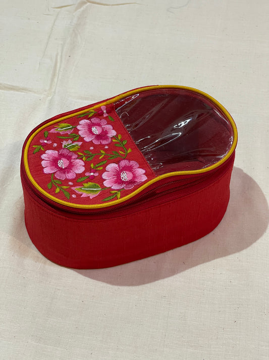 Embroidered oval shaped half transparent lid utility box