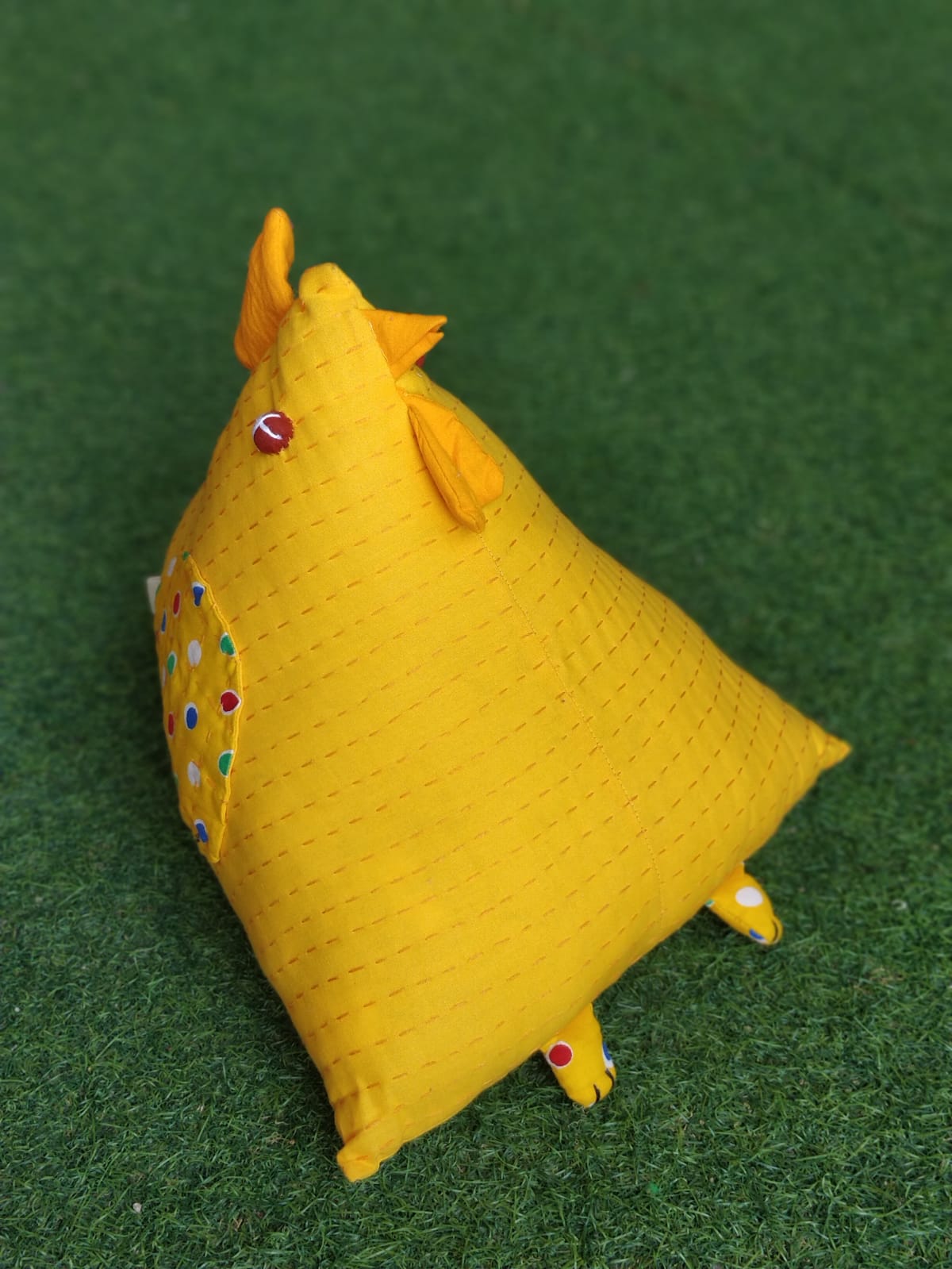 Yellow hen cushion made of upcycled fabric and hand embellished with kantha