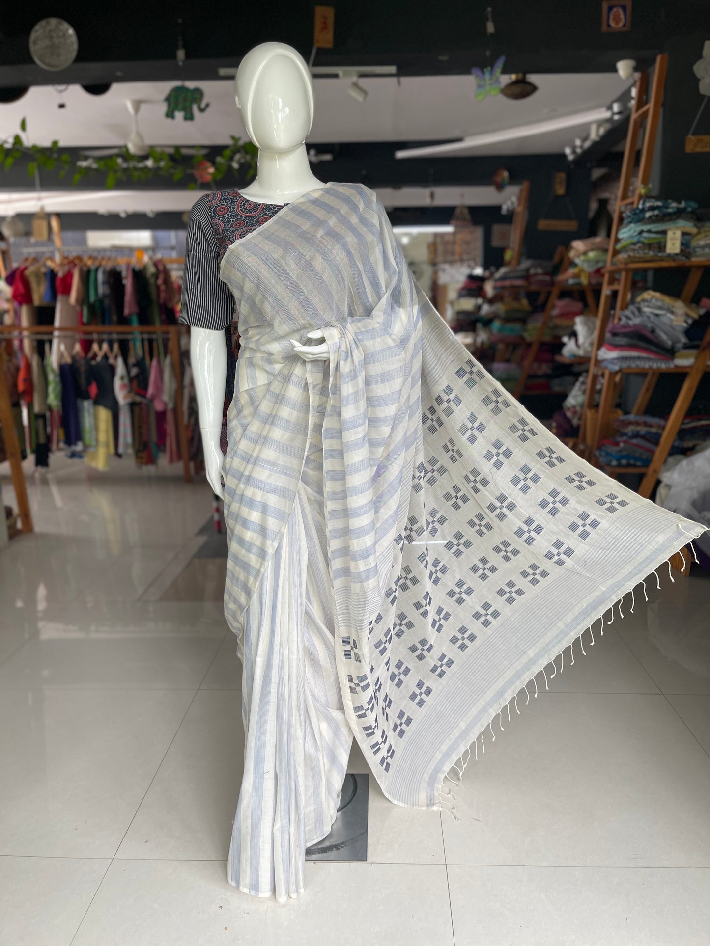 Off white handloom cotton saree with stripes body