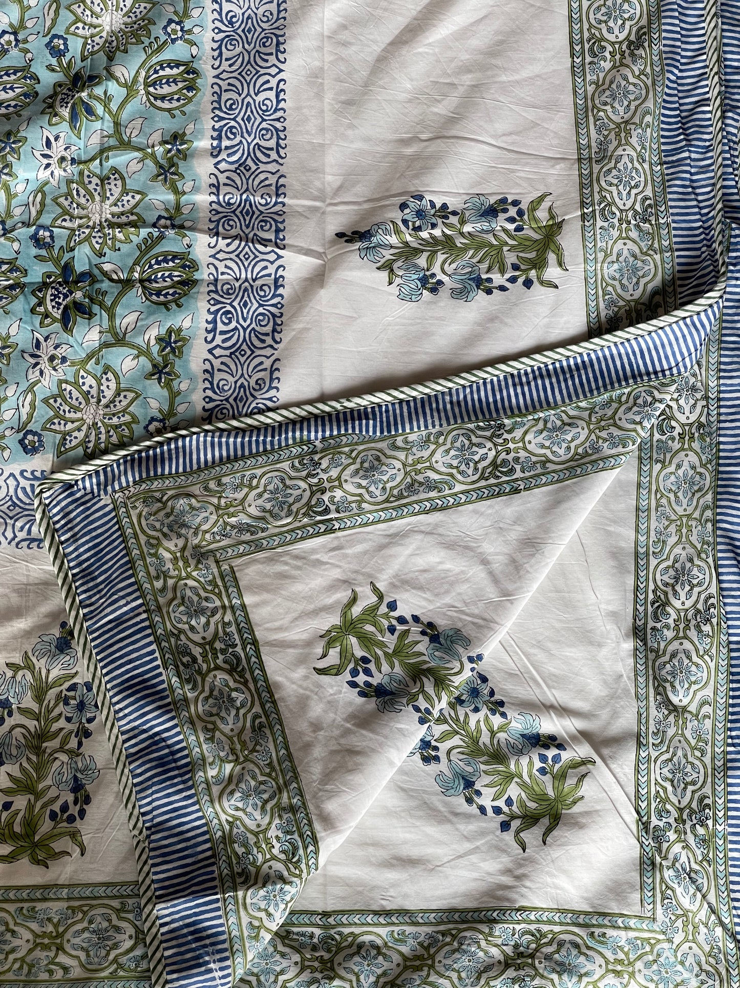 Blue center with white border hand block printed king size reversible comforter