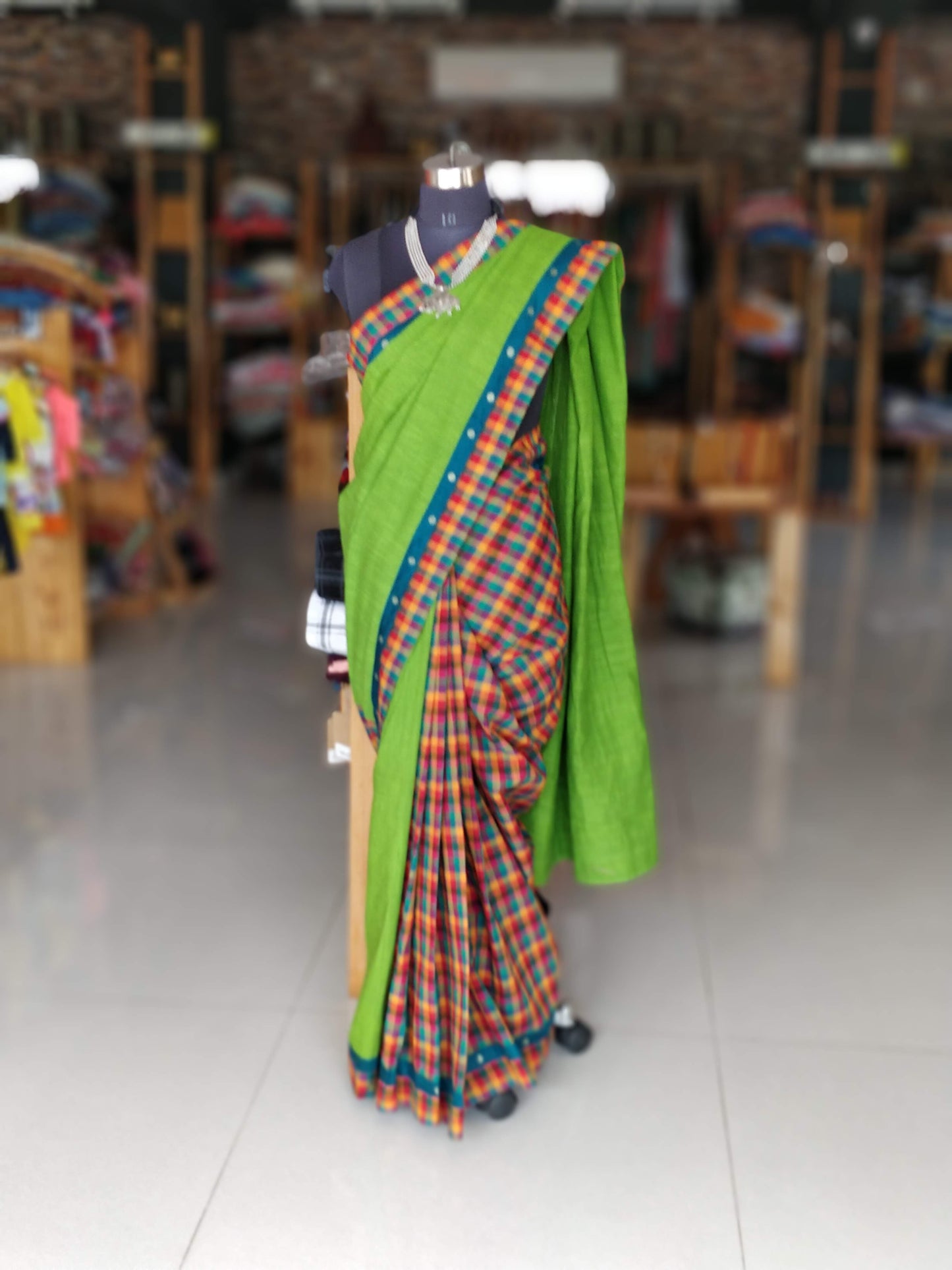 Green cotton with checks patch border saree