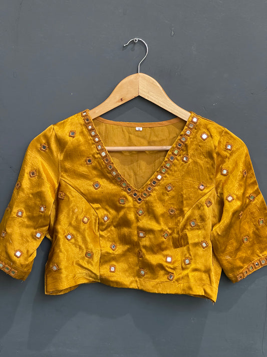 Mustard yellow mashru blouse with square mirrors embroidered on front and sleeves