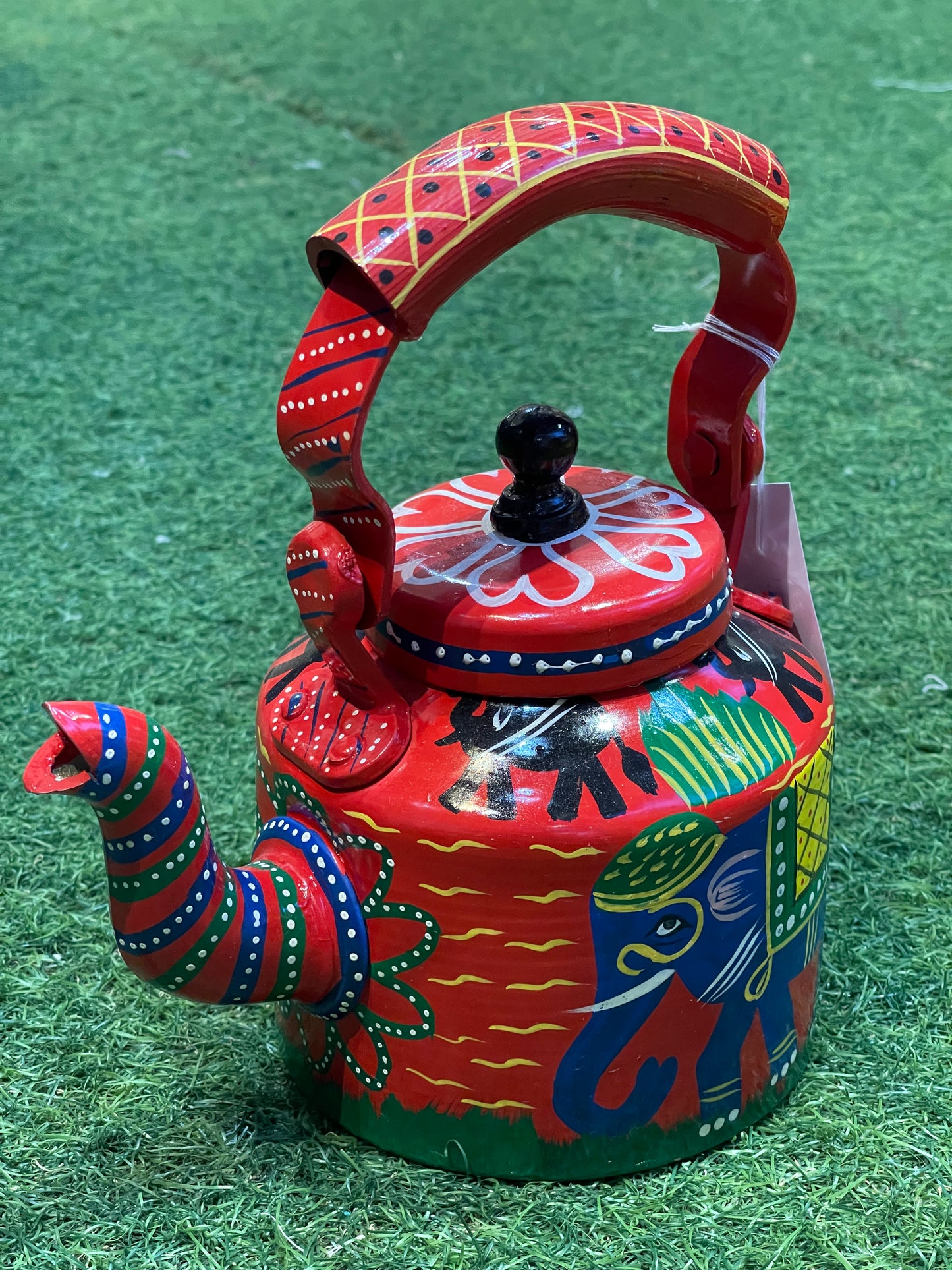 Red hand painted decorative kettle with elephants design