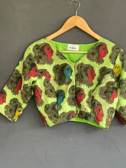 Green faces print kalamkari blouse with lining