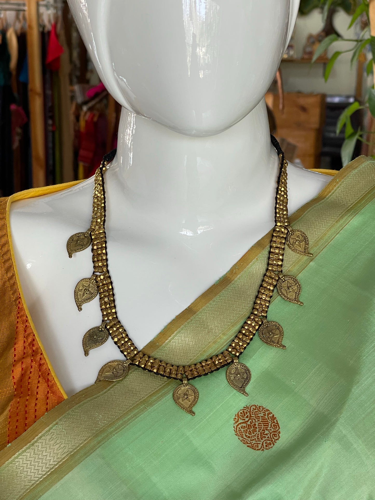 3 lines of dokra beads neckpiece with brass paisleys