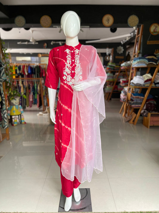 Red lehariya print dola silk suit set with hand embroidery and organza dupatta