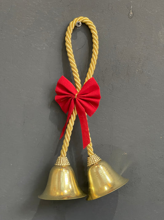 Cute metal bells hanging with bow