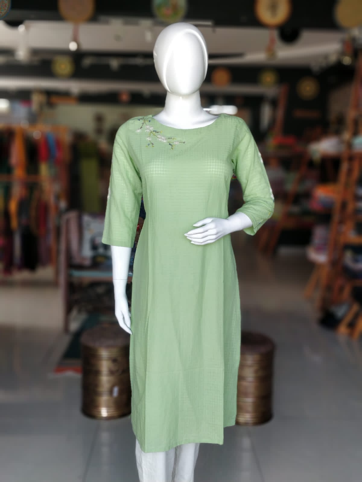 Pastel green cotton straight cotton kurti with floral hand embroidery for neck and sleeves