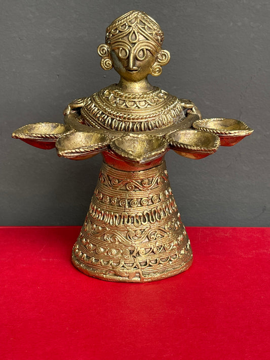 Lady holding diyas - Dokra brass craft