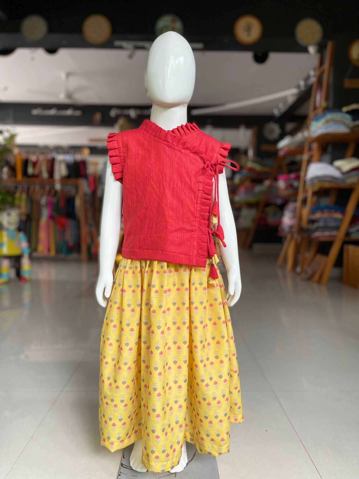 Yellow soft muslin lehenga with red cotton top for girls