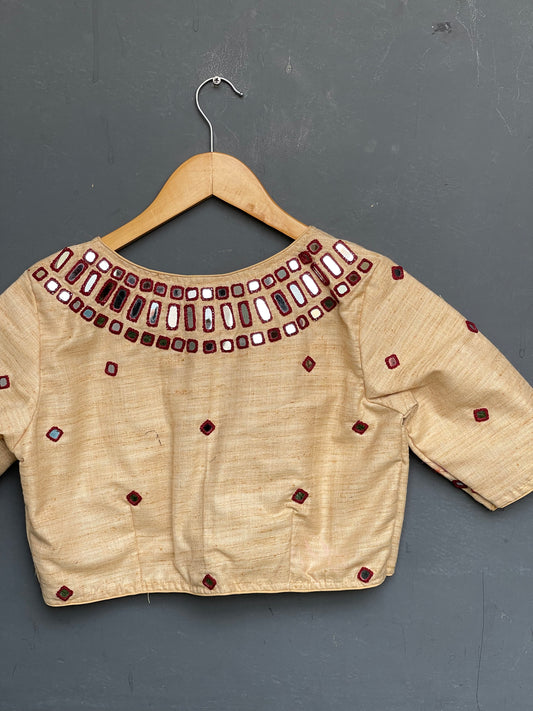 Cream hand embroidered silk blouse with maroon thread mirror work