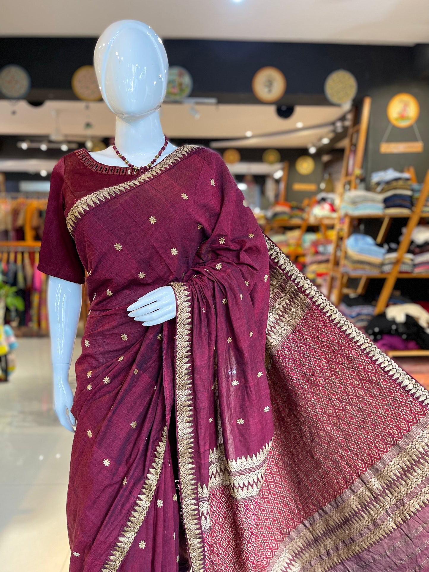 Maroon pure cotton Assam handloom saree with golden motifs