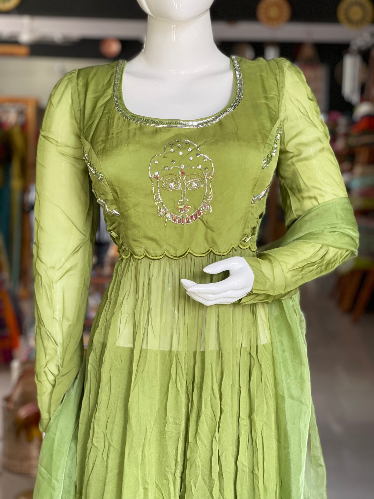 Green embroidered long top with matching pants and dupatta