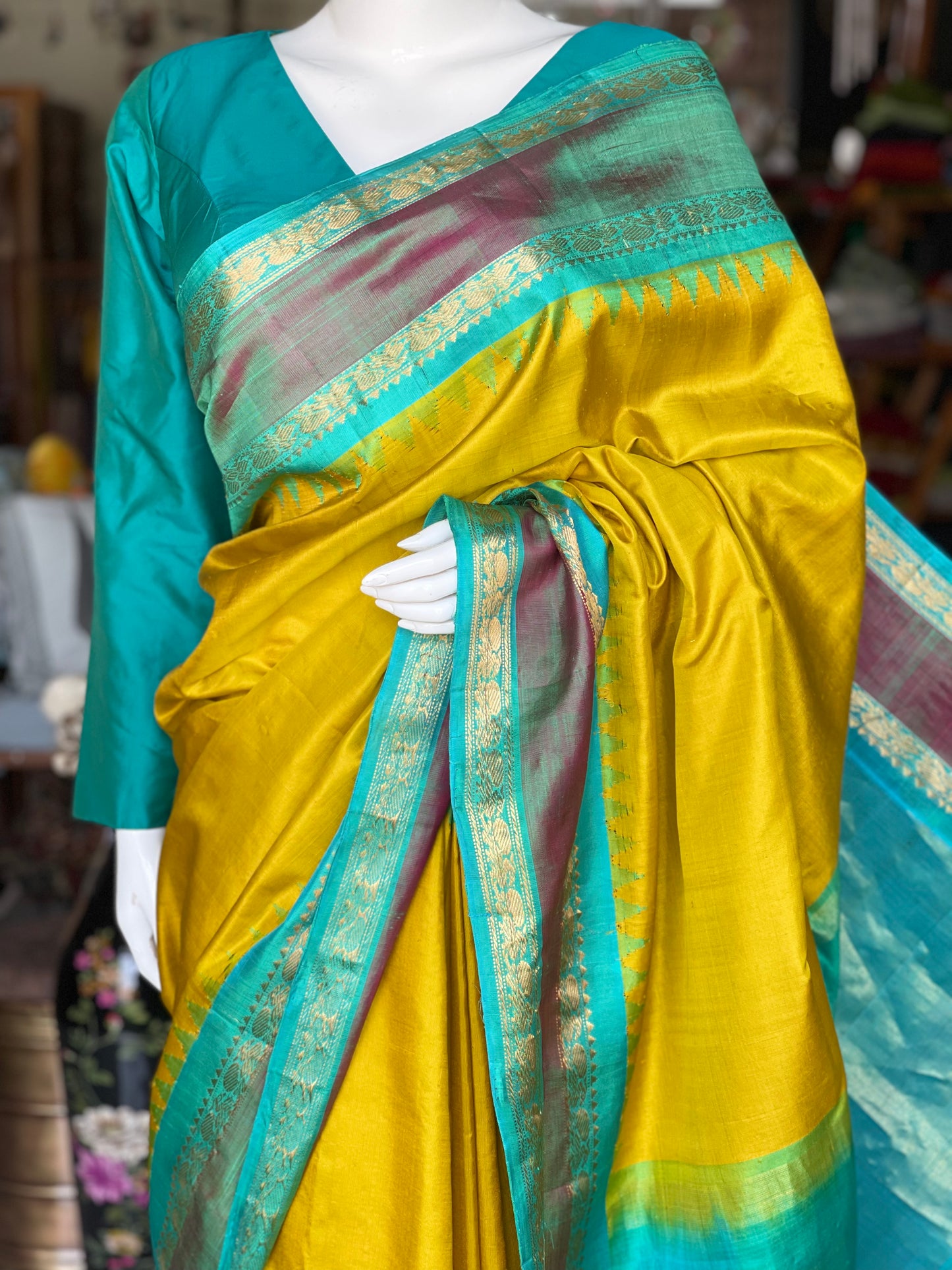 Beautiful mustard and green combination pure silk handwoven Gadwal saree with temple borders