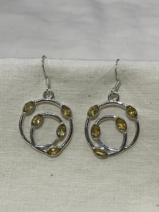 Silver round hooks with yellow stones