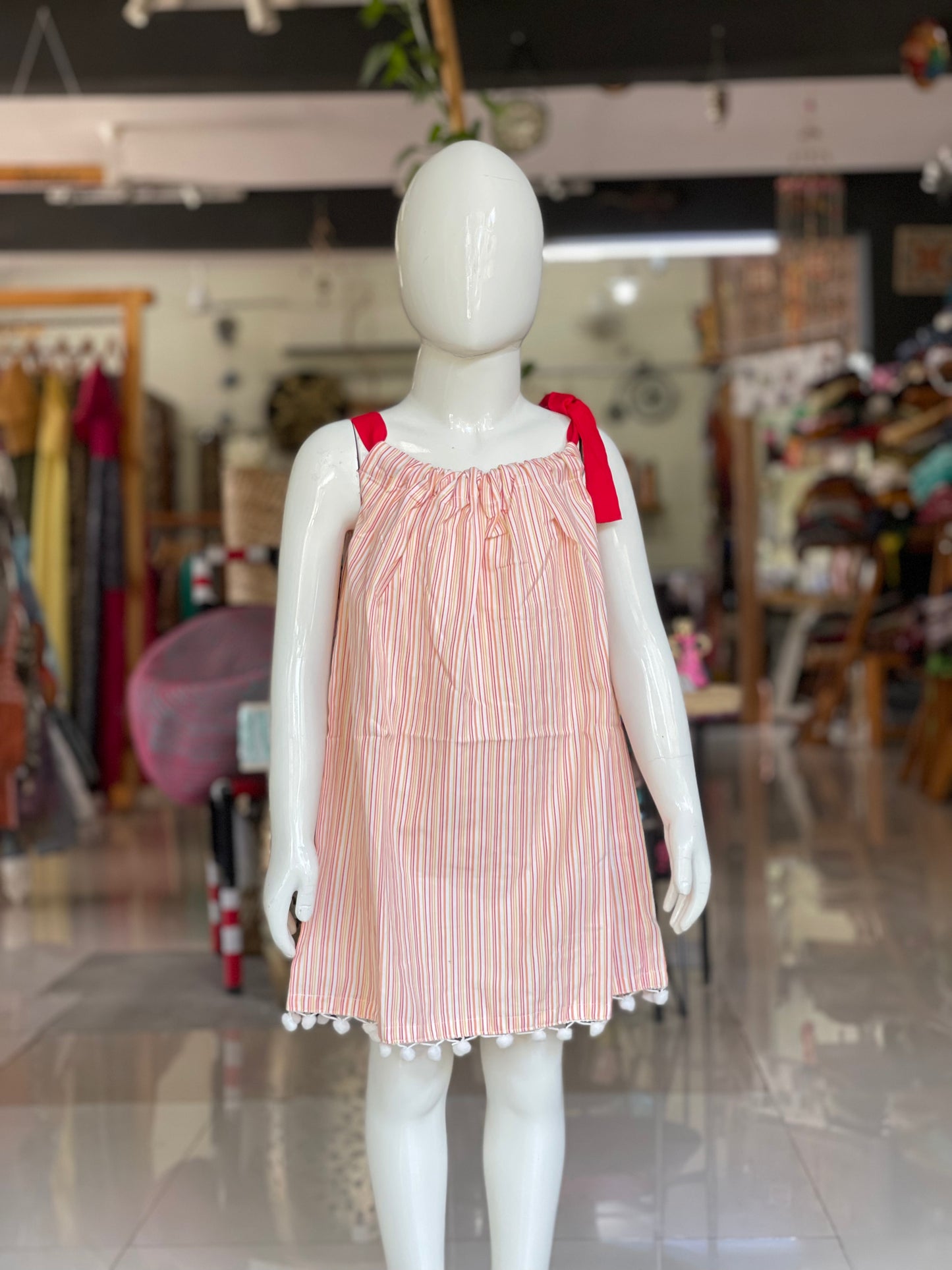 Pink stripes cotton frock for girls with Pom poms