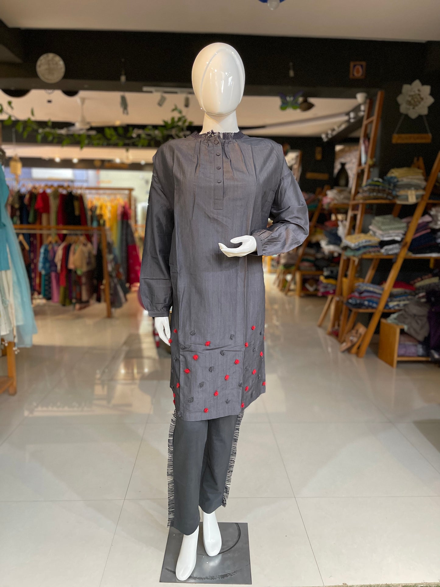 Charcoal dress with red pompom embroidery and pants